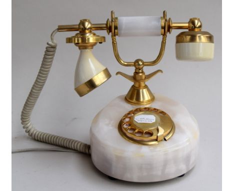 A Telcer Telefonia rotary telephone, polished onyx, 18K gold plated brass, made in Italy, adapted