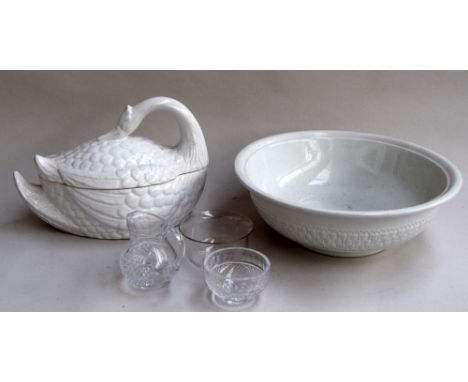 A ceramic wash bowl, soup tureen in the shape of a swan with ladle and three pieces of cut glass