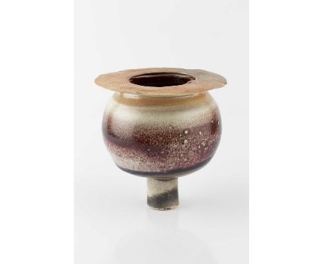 Colin Pearson (1923-2007)Footed bowlporcelain with ox blood glaze with an olive bandimpressed potter's seal16.5cm high.