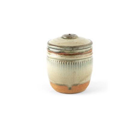 Richard Batterham (1936-2021)Caddy and covergreen ash glaze with blue highlights15.5cm high.Some surface roughness and chips 