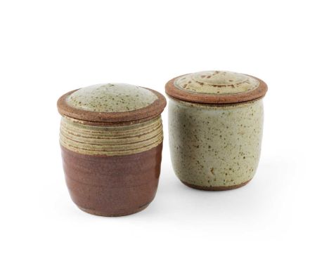 Richard Batterham (1936-2021)Two small lidded jarsoatmeal glazes9.4cm high.Both are in good condition with no signs of damage