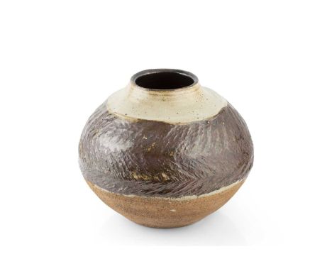Janet Leach (1918-1997) at Leach Potterylarge vasestoneware, squat form, with textured tenmoku band of glaze and a cream glaz