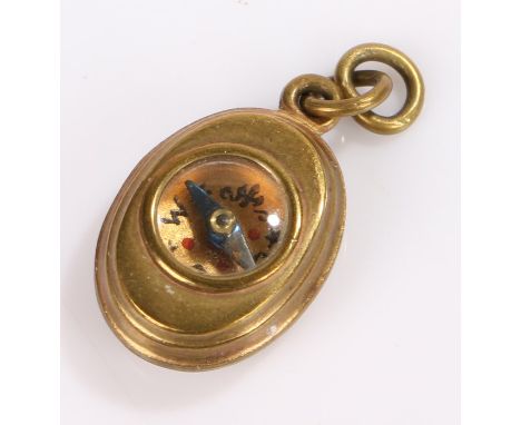 Miniature compass charm, housed within an oval case, 16mm high