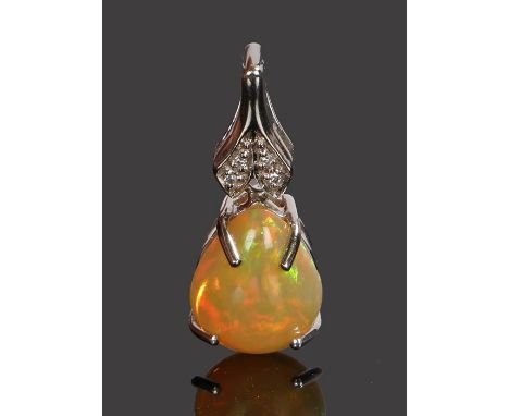 9 carat white gold opal and diamond pendant, the cabochon pear cut opal at 2.59 carats with diamonds above, 25mm high