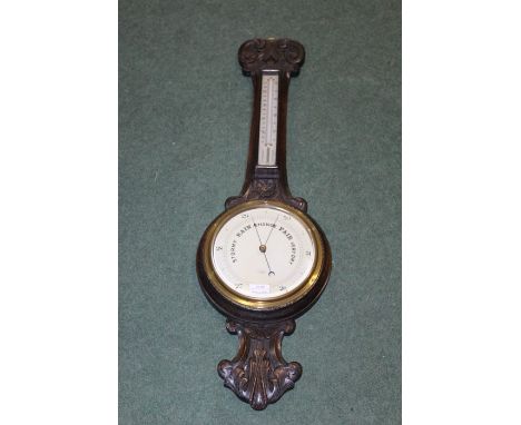 Oak cased banjo barometer/thermometer, retailers name J.A. Haskell Ipswich, 86cm