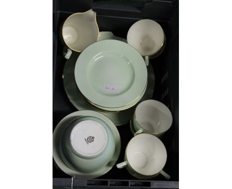 Minton bone china tea service, with green exteriors, white interiors and gilt borders (qty)