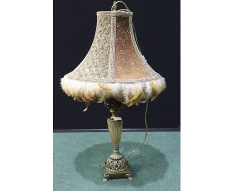 Reading lamp with feather edged shade, pierced brass and glass stem