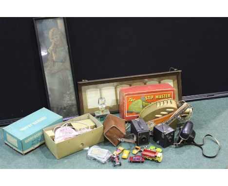 Collection of objects, to include a Morphy Richards hair dryer in original box, a film strip projector, three cameras, pictur