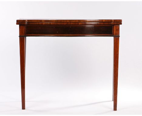 Regency mahogany serpentine card table, the serpentine top above a deep crossbanded frieze, the top opening to reveal a baize