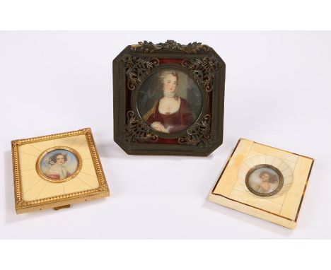 Two oval miniatures depicting ladies housed in bone and gilt frames, portrait miniture of a lady in a pierced metal frame (3)