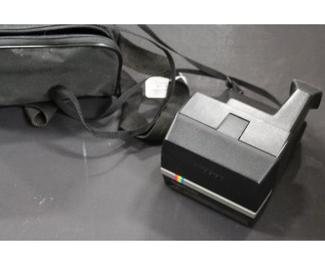 Polaroid Supercolor 635 camera, in a travelling case
