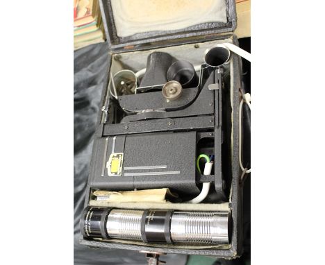 Society for Visual education inc. projector, with three lenses, housed in a fitted case