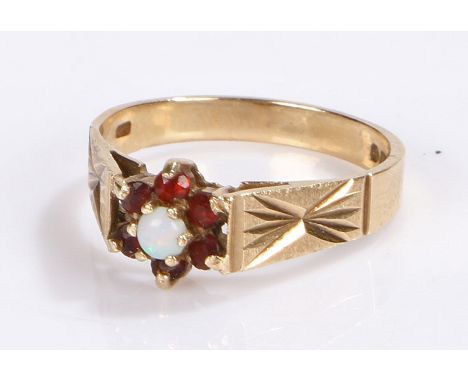 9 carat gold ring, set with a central opal, ring size M