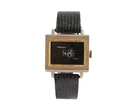 Dynasty mechanical digital watch, the black dial with open aperture to the centre revealing the hour and minutes dials, manua