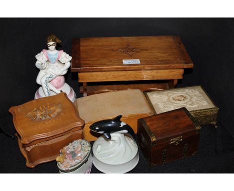 A collection of wooden and ceramic music boxes, (8)