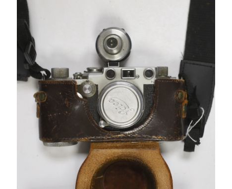 A Leica IIf camera, serial no. 577837, c. 1952-3, with Leitz Vidom viewfinder, Summar f+5cm 1.2 lens, in leather case with re