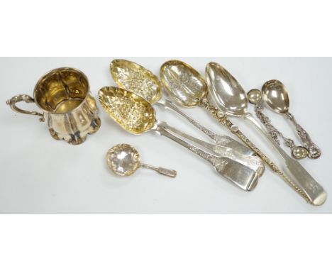 An Edwardian silver 'anointing spoon' Wakeley &amp; Wheeler, London, 1901, 25.5cm, eight other silver spoons including two 19