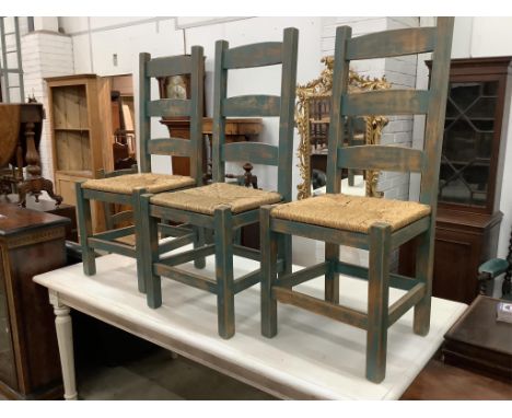 A set of six painted rush seat ladder back dining chairs, width 41cm, depth 40cm, height 107cm