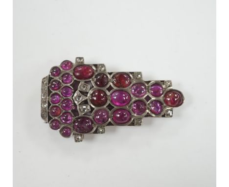 A 1920's? continental white metal cabochon ruby and rose cut diamond set clip brooch, 49mm.