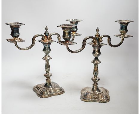 A modern pair of silver two branch, two light candelabra, C.J. Vander Ltd, London, 2000, height 25cm, weighable silver 36oz.
