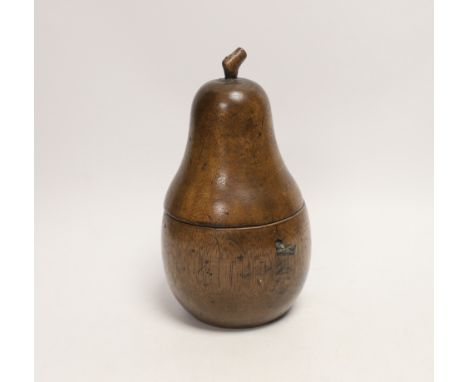 A treen pear shaped tea caddy, 18cm high