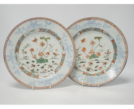 A pair of Chinese famille verte ‘lotus pond’ plates, Kangxi-Yongzheng period, 22.5cm One plate with old restoration as shown,
