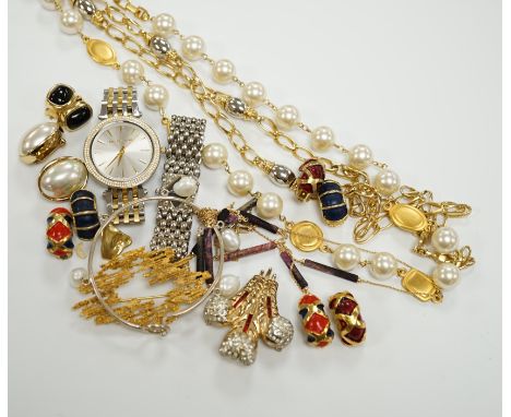 Two Christian Dior necklaces and three pairs of Dior ear clips, together with other signed pieces of costume jewellery.