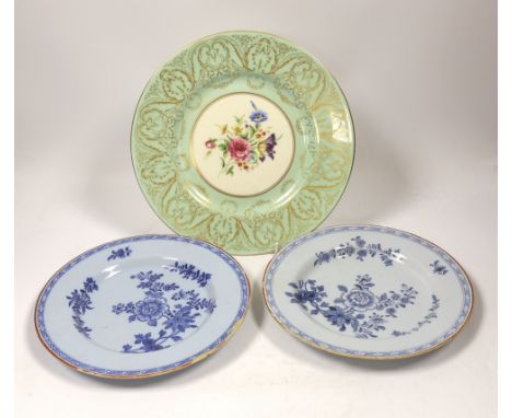 A pair of Delft plates, one dated 1771 and another Royal Worcester floral decorated plate, 27cm diameter
