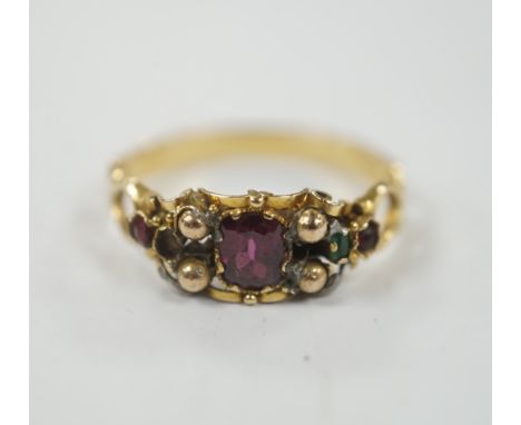 A Victorian yellow metal, garnet, ruby? and emerald set dress ring, (stones missing), size L, gross weight 1.8 grams.