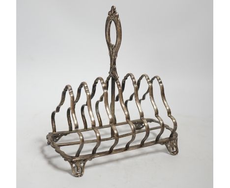 A Victorian silver seven bar toast rack, with loop handle, Henry Wilkinson &amp; Co Ltd, Sheffield, 1874, length 18cm, 10oz.