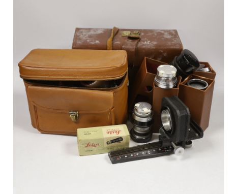Leica accessories including; a Leitz Visoflex I and Visoflex II, a Summarit f-5cm 1:1.5 lens, an Elmar f=9cm 1:4lens, a Super