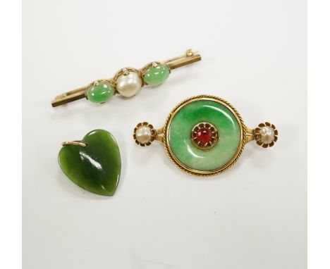 A Chinese 18k mounted, jade, cultured pearl and gem set disc brooch, 48mm, together with a yellow metal, jade and cultured pe