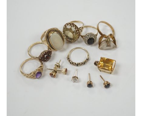 Seven assorted modern 9ct and gem set rings, including garnet cluster, white opal and amethyst, gross weight 26.2 grams, toge