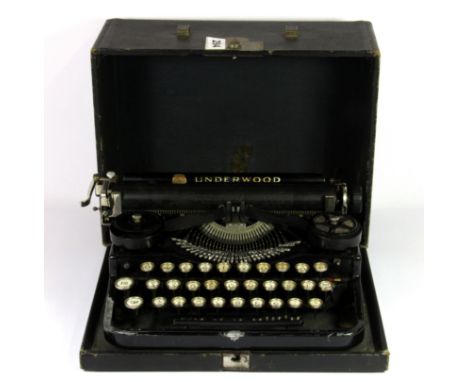 An early Underwood American portable typewriter with unusual keyboard.