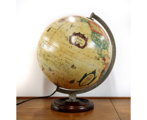 A vintage illuminated globe, H. 39cm.