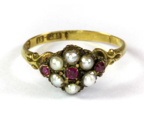 A Victorian 15ct yellow gold ruby and seed pearl cluster ring (O).