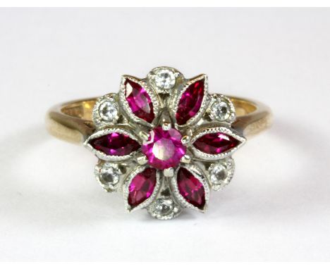 An antique 9ct yellow and white gold (stamped 9ct) ruby and white topaz cluster ring (L.5).