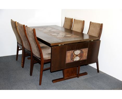 A 1970's Scandinavian dark oak tile inset dining table with extension leaves, 162 x 90cm, opens to 242cm, with a set of six F