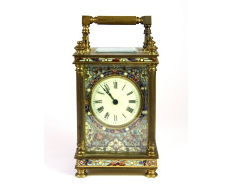 A 19th century French champleve enamelled gilt brass carriage clock, H. 15cm.