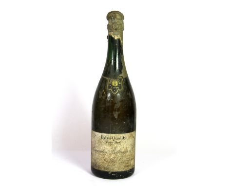 A bottle of 1943 Renaudin Bollinger vintage champagne.