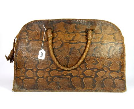 A vintage leather and snake skin bag, W. 50cm.