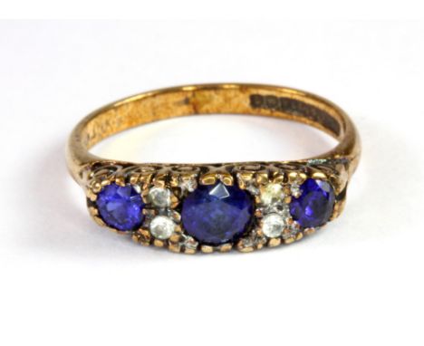 A Victorian 9ct yellow gold sapphire and white stone set half eternity ring (M.5).