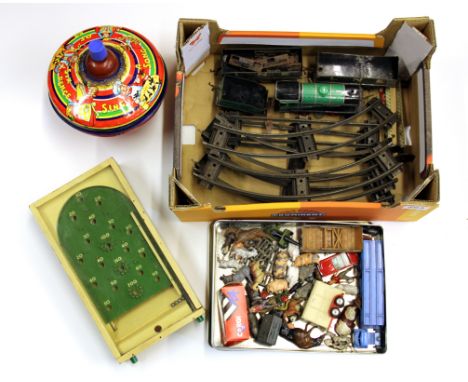 An 0 guage clockwork train set, Chad Valley bagatelle, tin toy top and a quantity of lead farm animals.