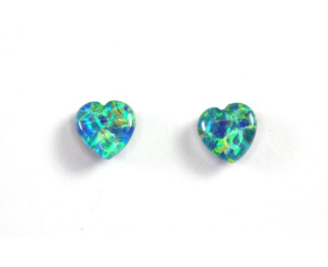 A pair of heart shaped triplet opal stud earrings.