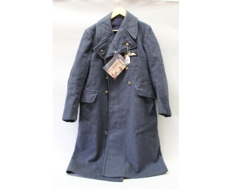A post WWII (1960) R.A.F. overcoat with a Red Cross Proficiency medal