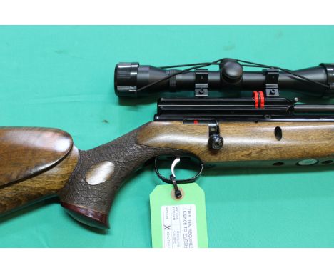 A Webley FX2000 .22 cal P.C.P. air rifle, complete with 4x32 scope and sound moderator, this fine air rifle also has the bene