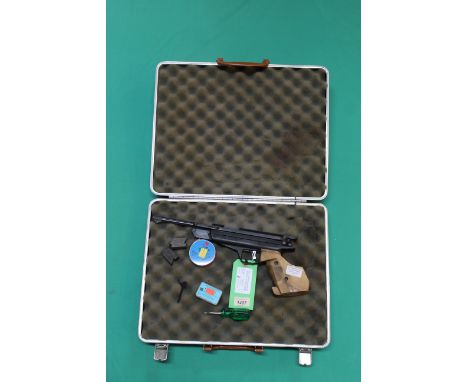 A Feinwerkbau model 80 .177 cal 'match' air pistol, S/No.246329, in overall good condition, comes with some accessories all w