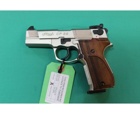 A cased 'Walther' CP88 .177 cal CO2 air pistol, this is the nickel version with wooden grips and is in excellent condition, t