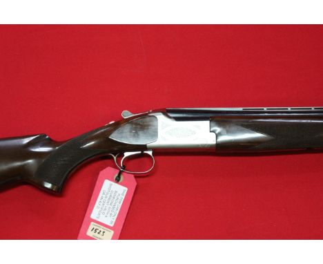A Browning 'Citori' over and under shotgun with 28" barrels and single selective trigger, in overall very good condition with