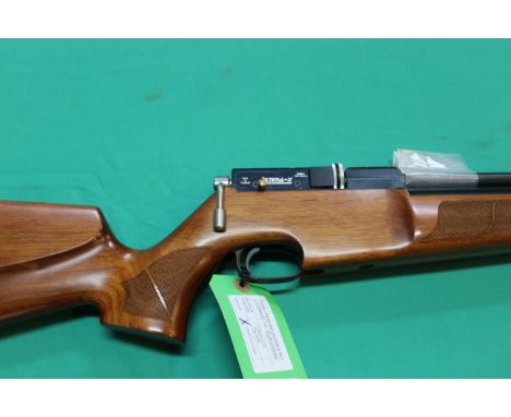 A Brocock .177 cal P.C.P. Ultima-X air rifle, S/No.1117, complete with magazine, as a post 1939 air weapon the restrictions o